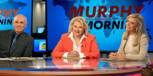 murphy-in-the-morning_frank-murphy-corky_sitting-at-on-air-desk_900x450